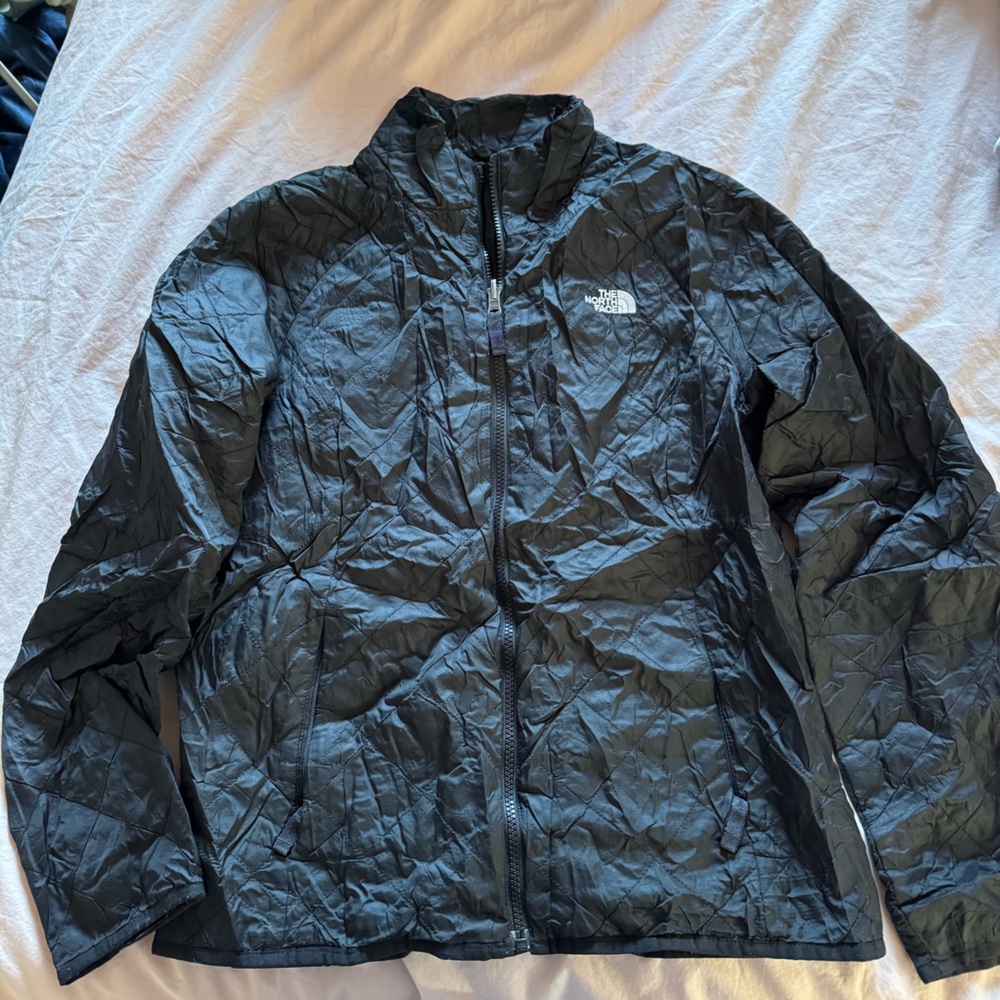 The North Face black down jacket size M